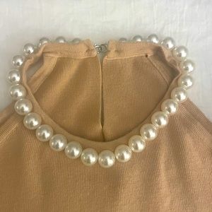 PEARL TRIMMED SOFT KNIT TOP IN CREAM. Size M/L